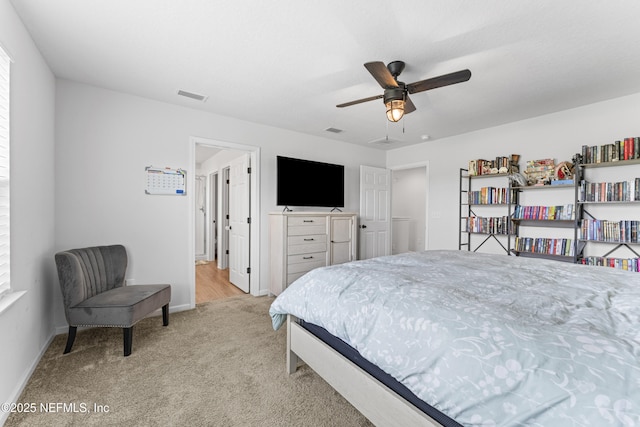 513 Sandstone Dr, Saint Augustine, FL 32086 - bedroom featuring baseboards, a ceiling fan, light colored carpet, and visible vents