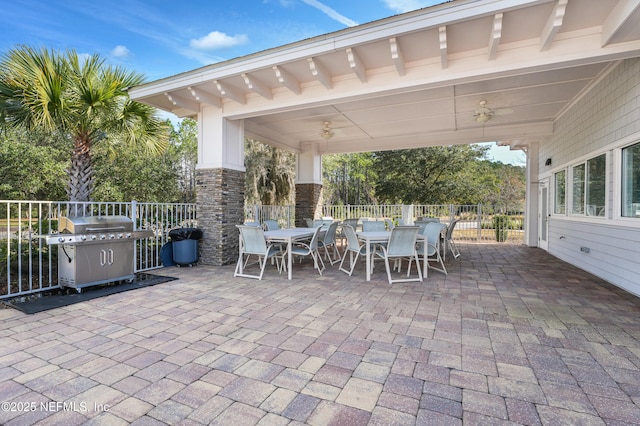513 Sandstone Dr, Saint Augustine, FL 32086 - view of patio featuring outdoor dining area, a ceiling fan, fence, and area for grilling