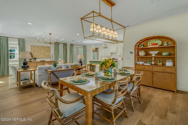 128 Sutton Dr, Ponte Vedra, FL 32081 - dining room featuring light wood-style floors, a chandelier, and recessed lighting