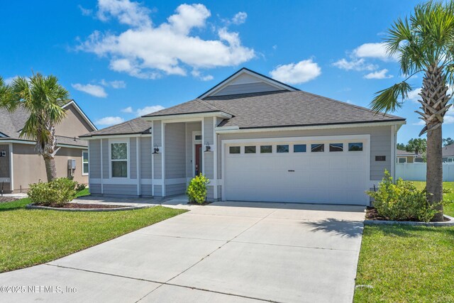 79 Dovetail Cir, Saint Augustine, FL 32095 - ranch-style home featuring concrete driveway, an attached garage, a shingled roof, and a front lawn