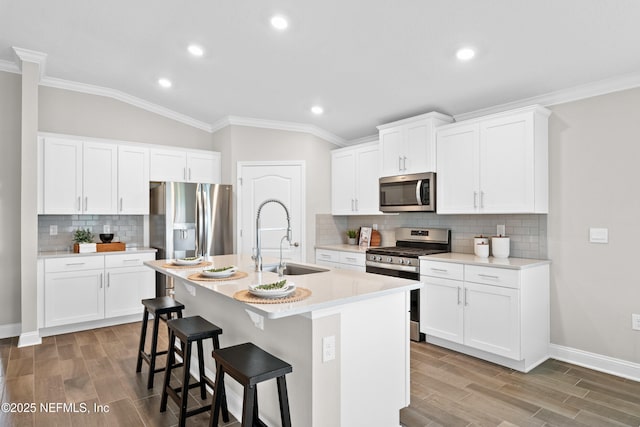 79 Dovetail Cir, Saint Augustine, FL 32095 - kitchen featuring crown molding, stainless steel appliances, and a sink