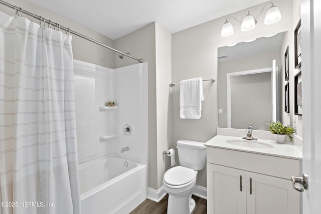 79 Dovetail Cir, Saint Augustine, FL 32095 - bathroom featuring a textured ceiling, shower / bath combo, wood finished floors, vanity, and toilet
