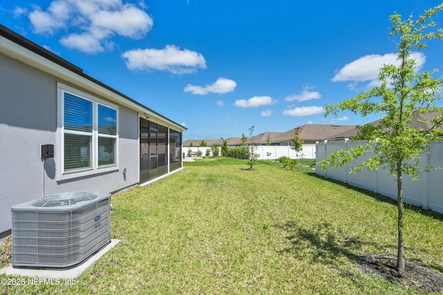 79 Dovetail Cir, Saint Augustine, FL 32095 - view of yard with a residential view, a sunroom, cooling unit, and fence private yard