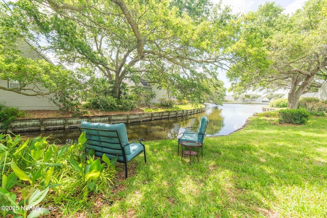 view of yard with a water view