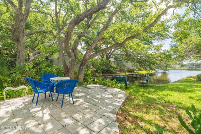 view of patio featuring a water view