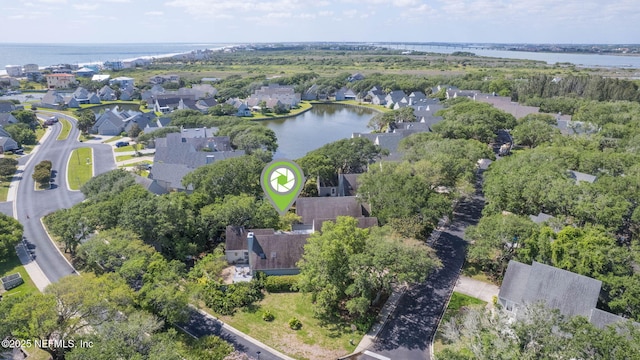 aerial view with a residential view and a water view