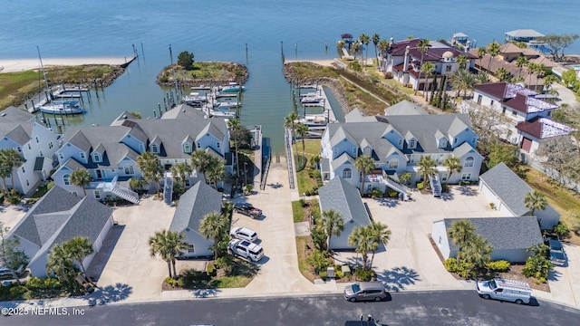 aerial view with a residential view and a water view
