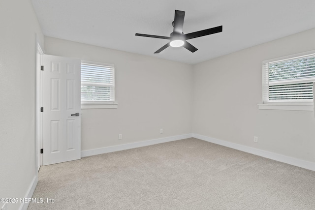 10856 Hawaii Dr S, Jacksonville, FL 32246 - empty room with plenty of natural light, carpet floors, and ceiling fan