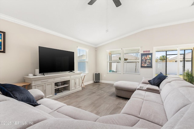 53 Dovetail Cir, Saint Augustine, FL 32095 - living area with crown molding, a ceiling fan, light wood-style flooring, and lofted ceiling