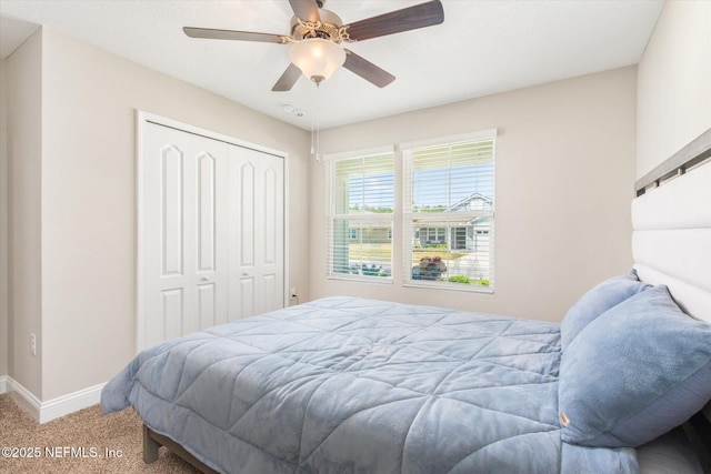 53 Dovetail Cir, Saint Augustine, FL 32095 - bedroom featuring baseboards, ceiling fan, carpet, and a closet