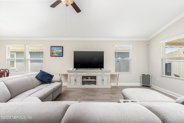 53 Dovetail Cir, Saint Augustine, FL 32095 - living room featuring baseboards, ornamental molding, light wood-style flooring, and ceiling fan