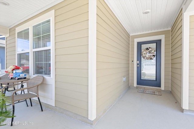 53 Dovetail Cir, Saint Augustine, FL 32095 - doorway to property with covered porch