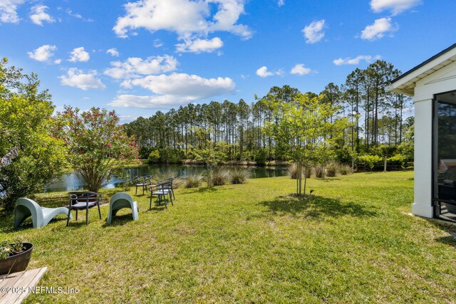 view of yard with a water view