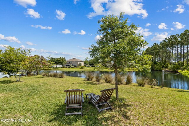 view of yard with a water view