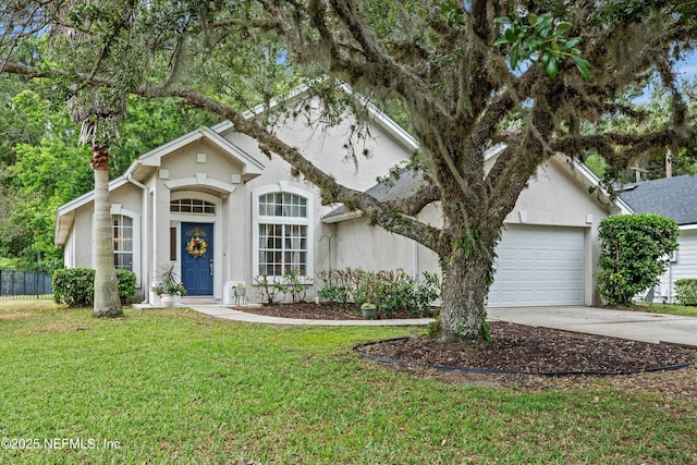 1105 Pine Mill Ln, Ponte Vedra Beach, FL 32082 - view of front of home with stucco siding, driveway, and an attached garage