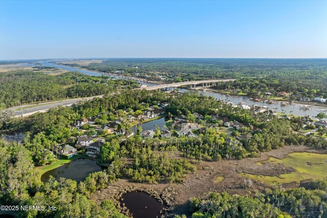 1105 Pine Mill Ln, Ponte Vedra Beach, FL 32082 - aerial view of property's location with a large body of water, a notable bridge, a forest, and nearby suburban area