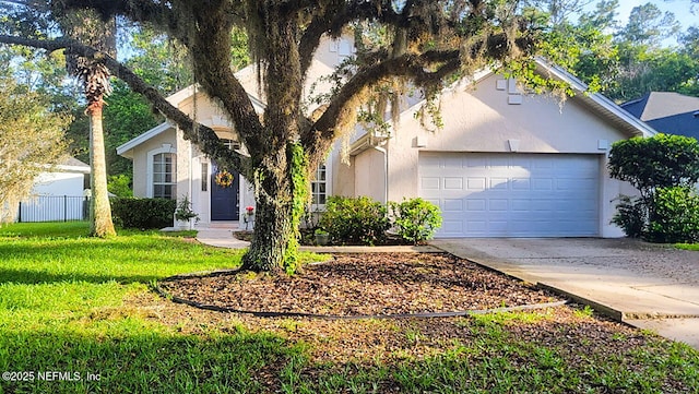 1105 Pine Mill Ln, Ponte Vedra Beach, FL 32082 - view of property hidden behind natural elements with concrete driveway, a garage, and stucco siding