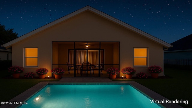 1105 Pine Mill Ln, Ponte Vedra Beach, FL 32082 - back of house at night featuring stucco siding, a patio, and an outdoor pool