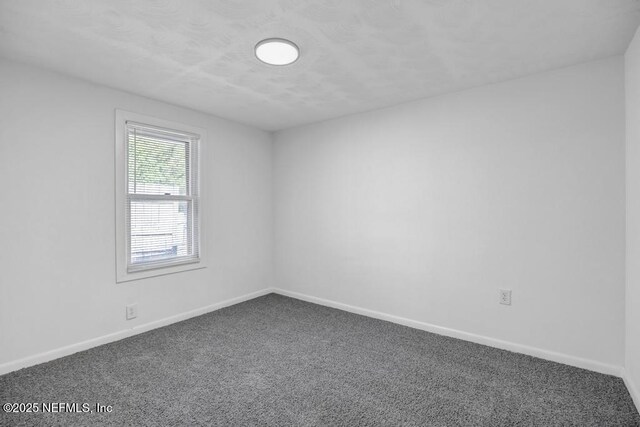 1059 Little Ruth Rd, Green Cove Springs, FL 32043 - unfurnished room featuring dark carpet and baseboards