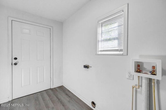 1059 Little Ruth Rd, Green Cove Springs, FL 32043 - washroom with washer hookup, baseboards, laundry area, and wood finished floors