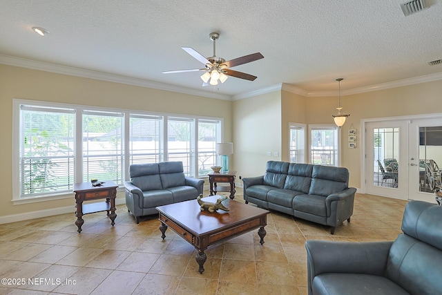 living room with visible vents, ornamental molding, a textured ceiling, french doors, and a ceiling fan