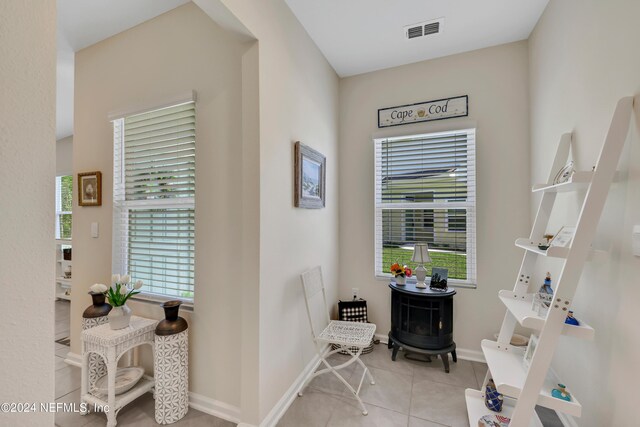 497 Coastline Way, Saint Augustine, FL 32092 - hall featuring tile patterned floors and baseboards