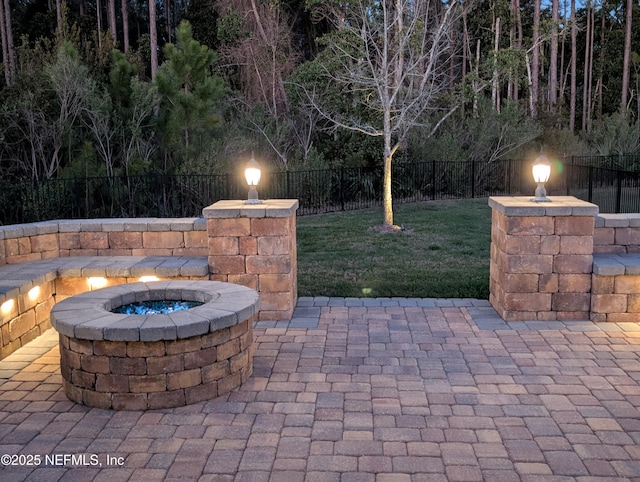 149 San Telmo Ct, Saint Augustine, FL 32095 - view of patio with a fenced backyard and an outdoor fire pit