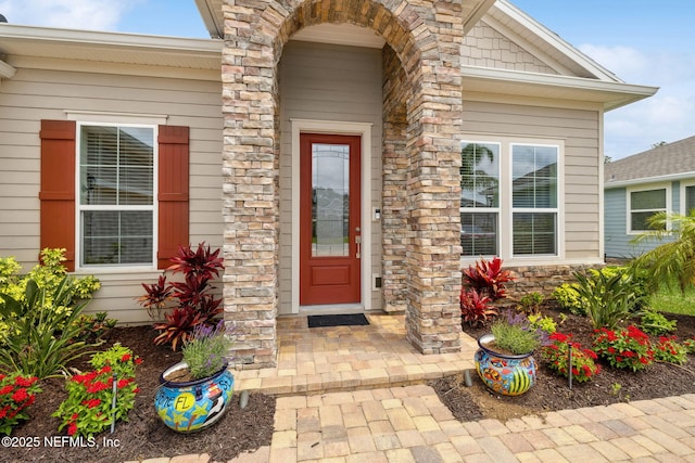149 San Telmo Ct, Saint Augustine, FL 32095 - view of exterior entry featuring stone siding