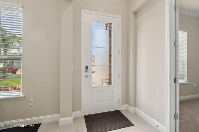 149 San Telmo Ct, Saint Augustine, FL 32095 - doorway to outside featuring plenty of natural light and baseboards