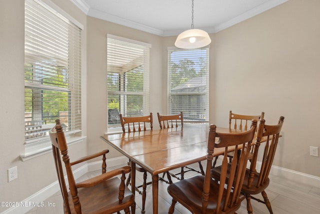149 San Telmo Ct, Saint Augustine, FL 32095 - dining space featuring baseboards and crown molding