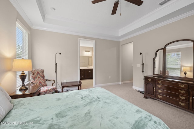 149 San Telmo Ct, Saint Augustine, FL 32095 - carpeted bedroom with a tray ceiling, crown molding, ensuite bathroom, and visible vents