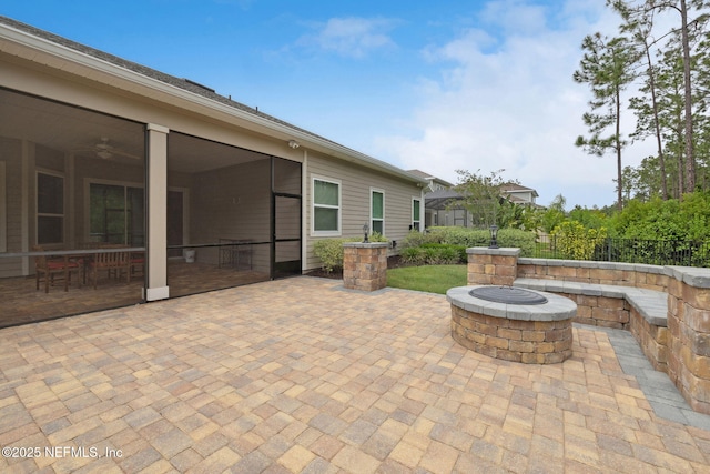 149 San Telmo Ct, Saint Augustine, FL 32095 - view of patio featuring an outdoor fire pit and fence