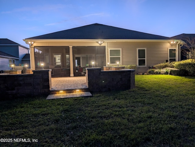 149 San Telmo Ct, Saint Augustine, FL 32095 - back of property with a lawn, a patio area, and a sunroom