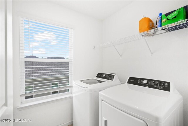 115 Beauclair Blvd, Saint Augustine, FL 32084 - clothes washing area with independent washer and dryer and laundry area