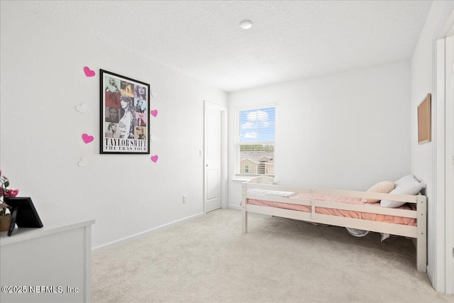 115 Beauclair Blvd, Saint Augustine, FL 32084 - bedroom with baseboards, a textured ceiling, and light carpet