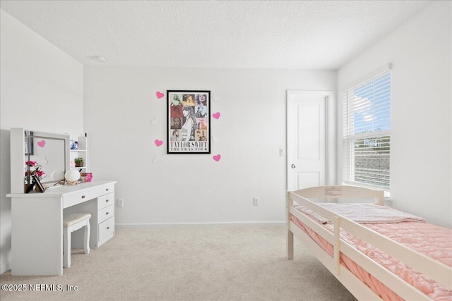115 Beauclair Blvd, Saint Augustine, FL 32084 - bedroom with a textured ceiling, light carpet, and baseboards