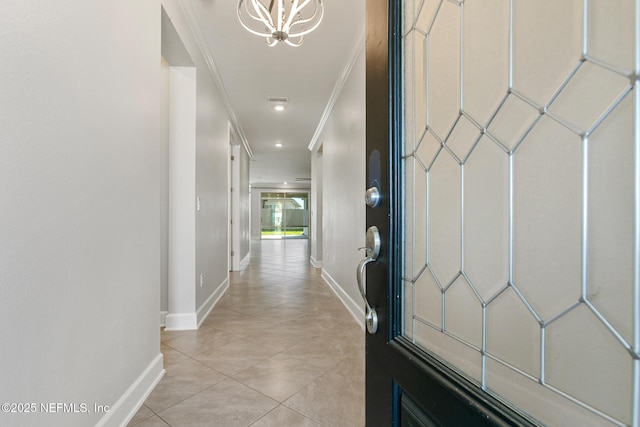 corridor featuring a chandelier, recessed lighting, baseboards, light tile patterned floors, and ornamental molding