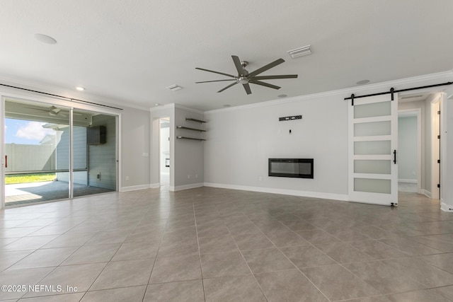 unfurnished living room featuring light tile patterned flooring, ceiling fan, a barn door, visible vents, and ornamental molding