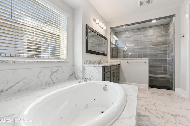 full bath featuring visible vents, vanity, marble finish floor, a whirlpool tub, and a walk in shower