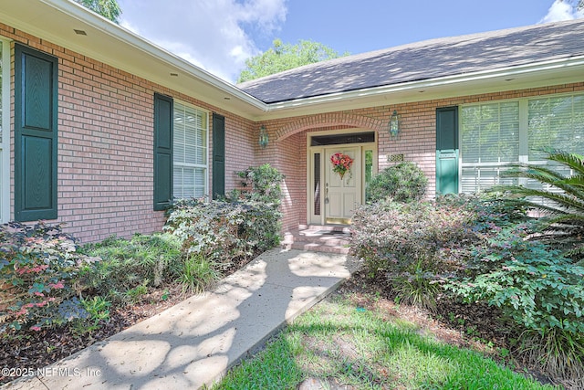3666 Cypress Point Ct, Green Cove Springs, FL 32043 - doorway to property featuring brick siding and roof with shingles