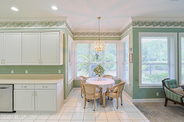 3666 Cypress Point Ct, Green Cove Springs, FL 32043 - dining room featuring baseboards, a chandelier, ornamental molding, light tile patterned floors, and a textured ceiling