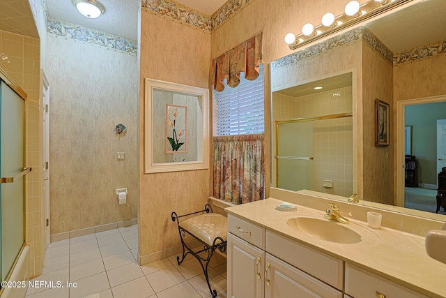 3666 Cypress Point Ct, Green Cove Springs, FL 32043 - bathroom featuring a shower with shower door, tile patterned flooring, baseboards, and vanity
