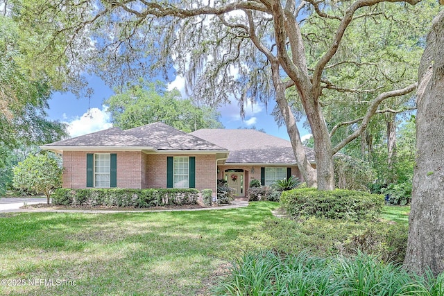 3666 Cypress Point Ct, Green Cove Springs, FL 32043 - single story home with brick siding, a front lawn, and roof with shingles