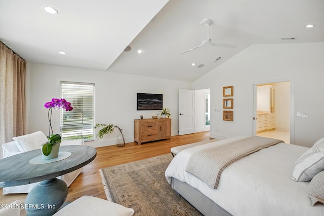 bedroom with visible vents, recessed lighting, light wood-style flooring, and lofted ceiling