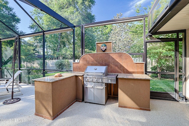 3593 Long Cove Ct, Green Cove Springs, FL 32043 - view of patio / terrace featuring exterior kitchen, area for grilling, and glass enclosure