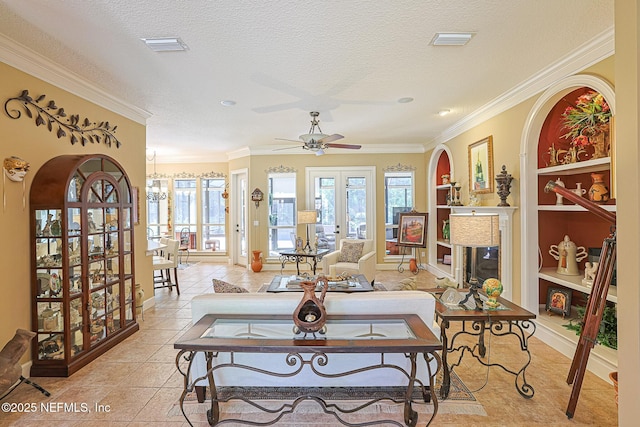 3593 Long Cove Ct, Green Cove Springs, FL 32043 - living room featuring visible vents, a ceiling fan, ornamental molding, and a glass covered fireplace