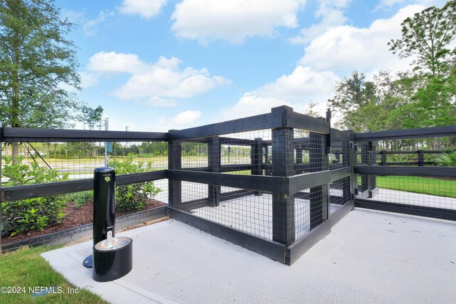384 Pelton Pl, Saint Johns, FL 32259 - wooden terrace featuring exterior structure and an outbuilding