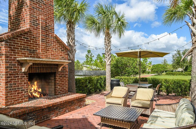 384 Pelton Pl, Saint Johns, FL 32259 - view of patio / terrace featuring an outdoor brick fireplace