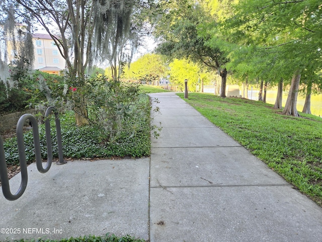 view of home's community featuring a lawn