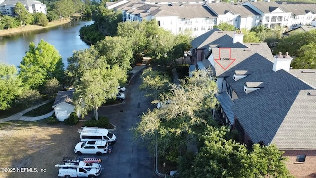 aerial view with a water view and a residential view